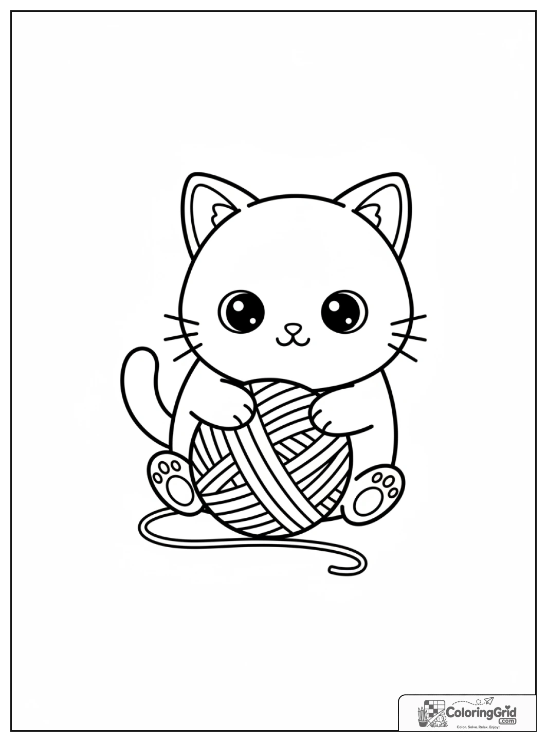 Chaton mignon jouant avec une pelote de laine.